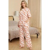 image:imagePrinStory Pajamas for Women Soft Pjs Lounge Set S4XL  Short Sleeve Tops and Long Pants 2 Piece Stretchy Pjs Set with Pockets for Sleep Home Travel Vacation Maternity NursingFpwh Orange Feather